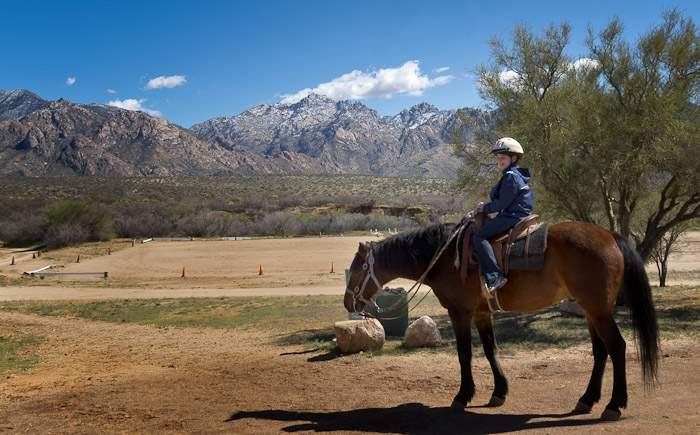 Aidan on horse w mtns